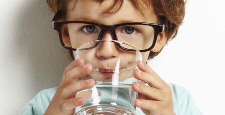 Young Boy Drinking Water